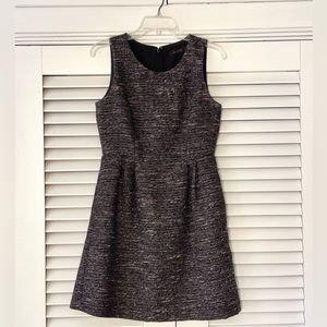 Limited dress in charcoal with pink highlights for office or night out.